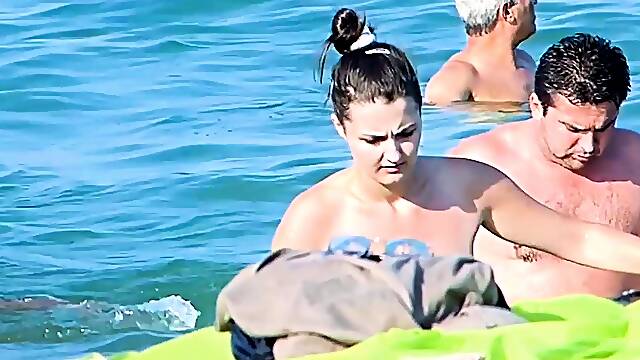 Fresh young nudist chicks caught on a voyeur camera