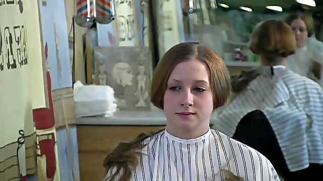 Swimming team girls shave their heads