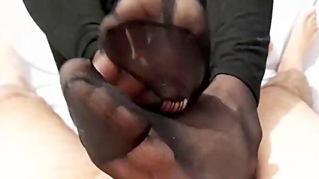 Footjob with cum inside nylons