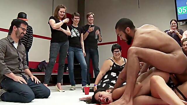 Lesbian wrestler ties opponent and lets public finger fuck her then gangbang fuck and double penetration on mats