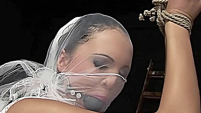 Brides ordeal is with painful bondage, and painful sex. Introducing: Regina Moon