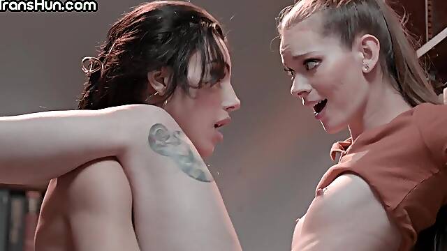 Seductive lesbian tgirl goddess fucks babe in library