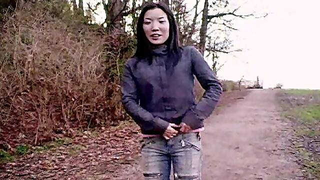 Horny Japanese Babe Strips Outdoors And Shows Her Hot Pussy