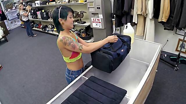 Shorts-clad Asian chick with a hot tattooed body sucking a stranger's cock
